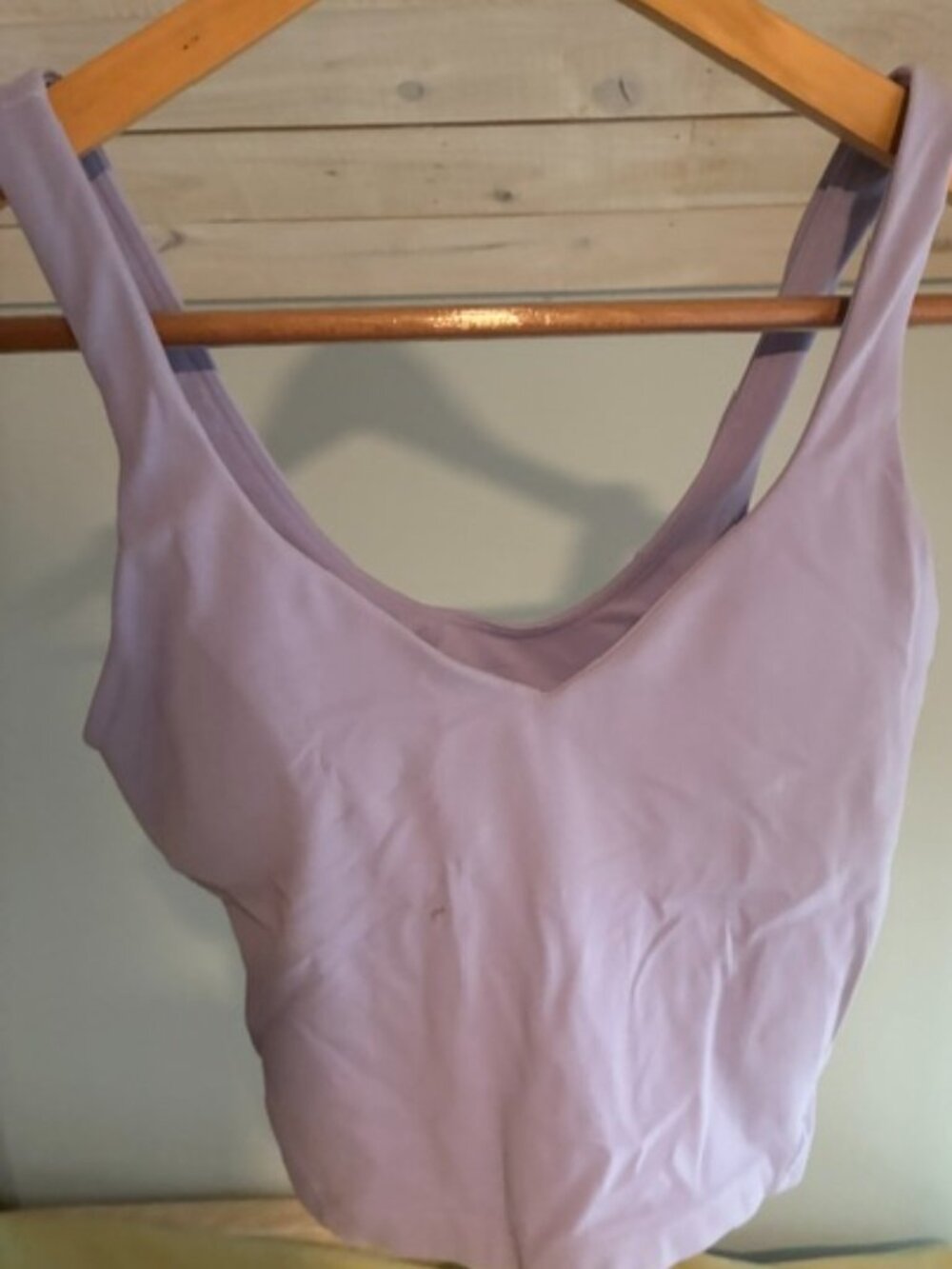 Lululemon size 4 women workout top with built in bra, in a beautiful pale purple